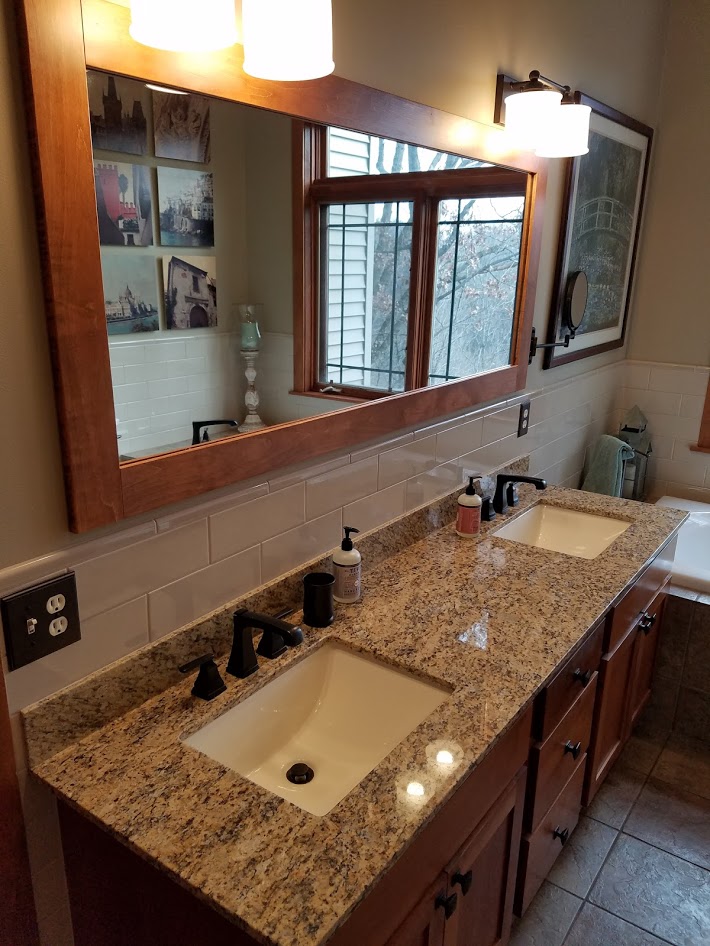 double vanity with granite top and mirror