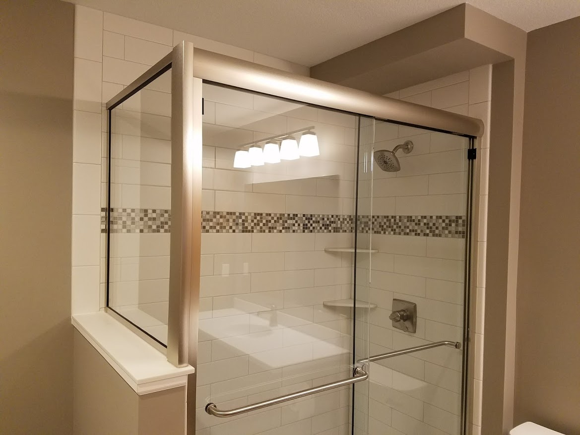 Tile shower with custom glass
