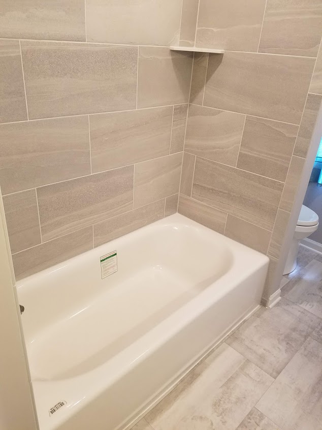 Bathtub with tile surround